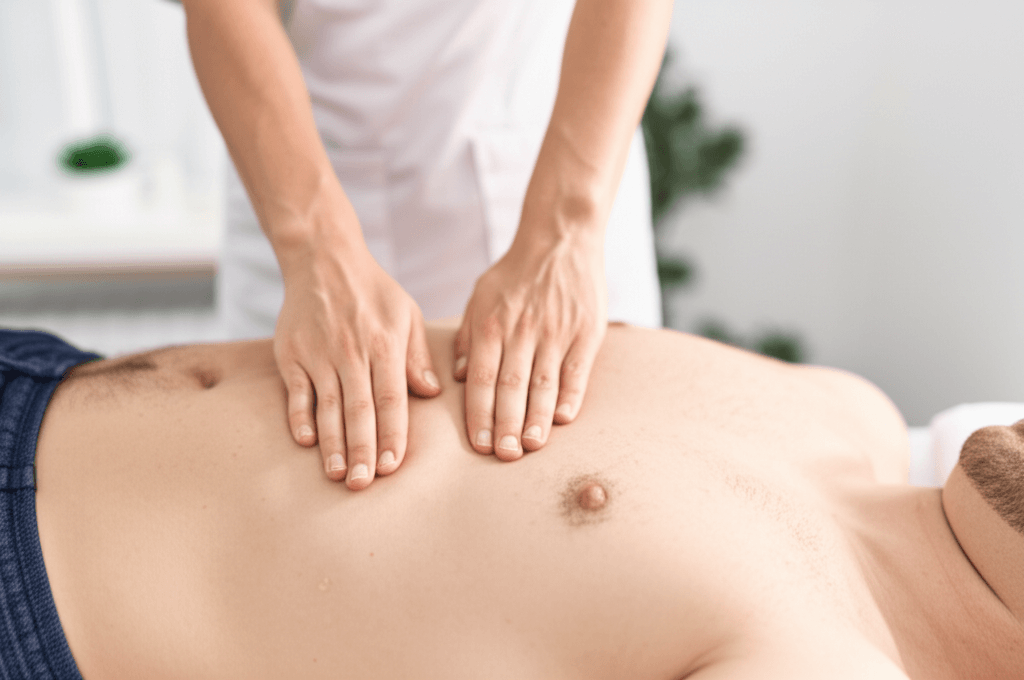Visceral manipulation technique being performed